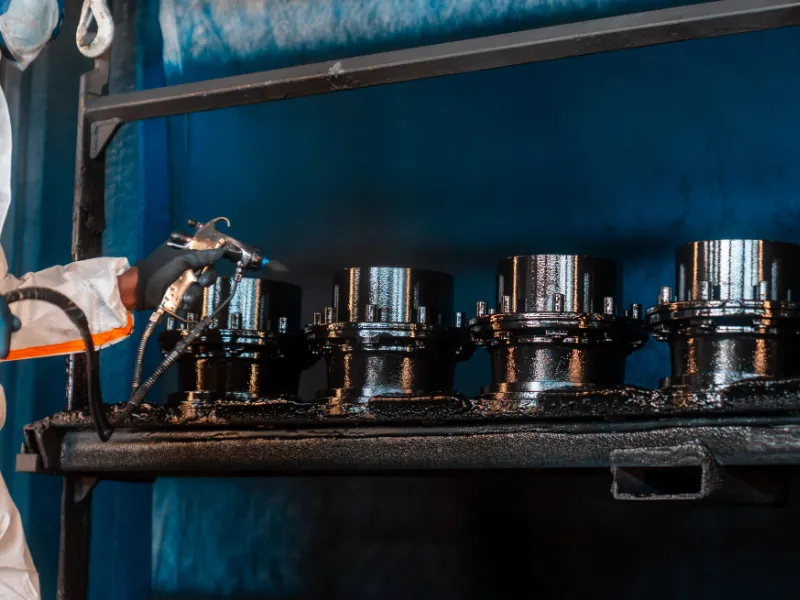 rivestimento-particolari-industriali-componenti-cilindrici-neri